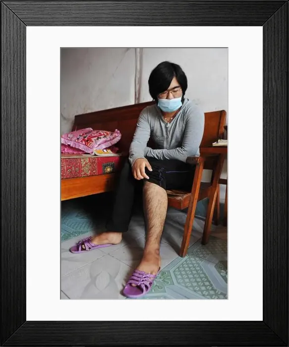 Framed Print : Young Chinese girl Na Na, who has beard and mustache on the face Framed Print : Young Chinese girl Na Na, who has beard and mustache on the face