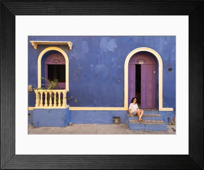 Framed Print : A woman in a doorway on the colourful streets of Getsemani, Cartagena, Colombia Framed Print : A woman in a doorway on the colourful streets of Getsemani, Cartagena, Colombia