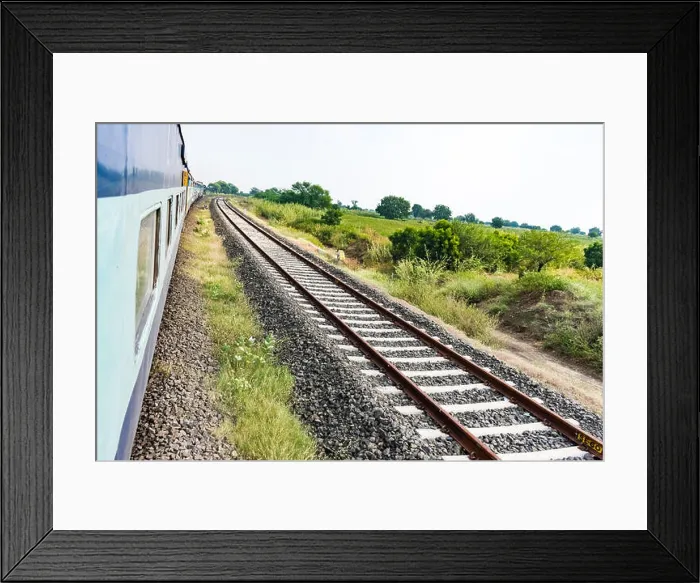 Framed Print : running train side view with railway track looking awesome Framed Print : running train side view with railway track looking awesome