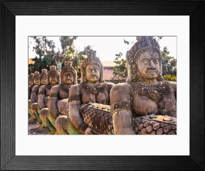 Framed Print : Row of warrior statues carrying a giant serpent Framed Print : Row of warrior statues carrying a giant serpent