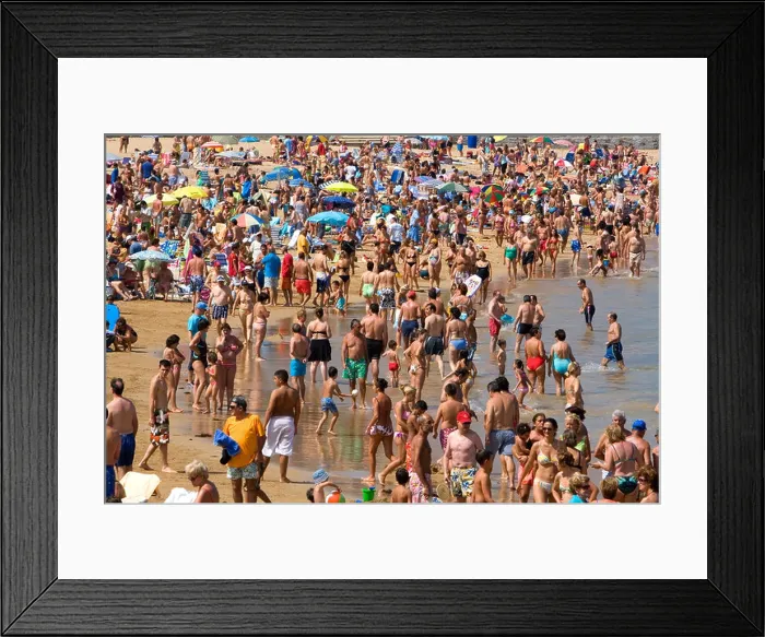 Framed Print : Crowded beach scene at Castro Urdiales Cantabria northern Spain Framed Print : Crowded beach scene at Castro Urdiales Cantabria northern Spain
