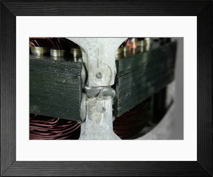 Framed Print : Epoxy adhesive used to hold electric motor components together Framed Print : Epoxy adhesive used to hold electric motor components together