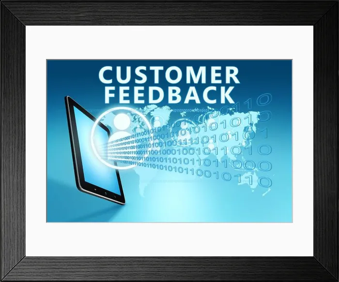 Framed Print : Customer Feedback - text with social icons and tablet computer on blue digital world map background Framed Print : Customer Feedback - text with social icons and tablet computer on blue digital world map background