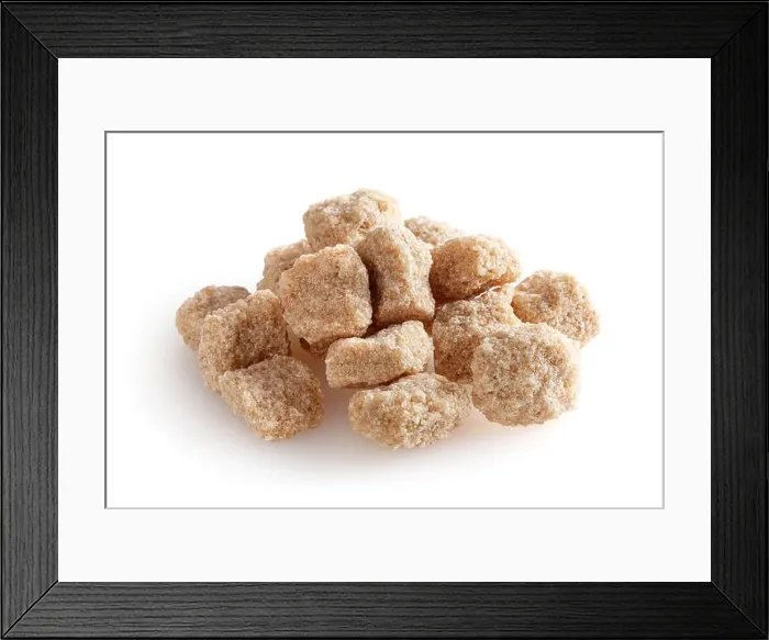 Framed Print : Cubes of brown cane sugar isolated on white background Framed Print : Cubes of brown cane sugar isolated on white background