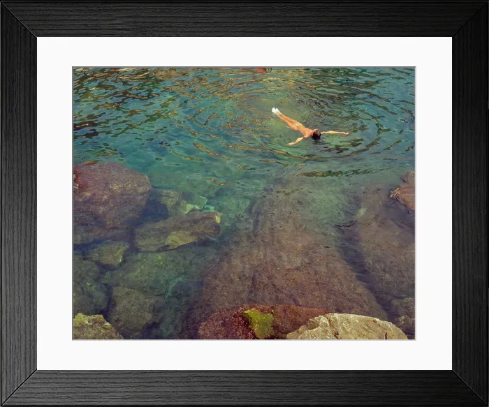 Framed Print : Woman floating on her back in the water Framed Print : Woman floating on her back in the water