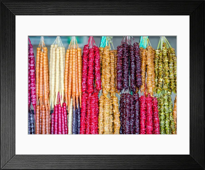 Framed Print : Multicolored delicious fresh Georgian Sweets Churchkhela hanging in the market Framed Print : Multicolored delicious fresh Georgian Sweets Churchkhela hanging in the market
