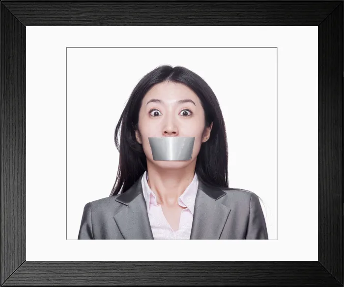 Framed Print : Businesswoman with her mouth caver with duct tape Framed Print : Businesswoman with her mouth caver with duct tape