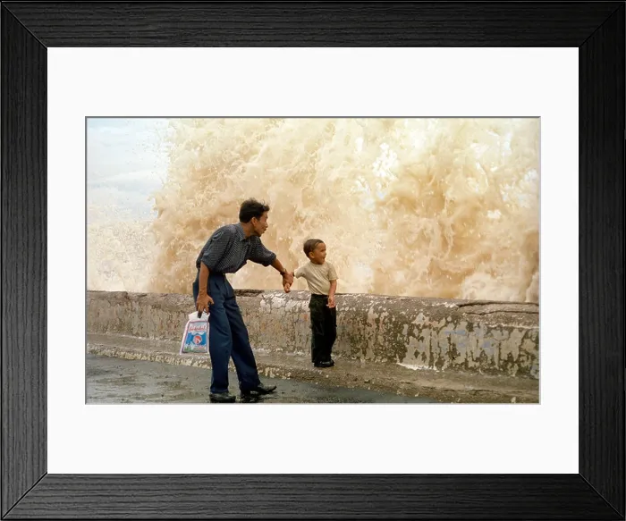 Framed Print : ASB79438 Indian father and son enjoying huge sea waves in Bombay monsoon in India Framed Print : ASB79438 Indian father and son enjoying huge sea waves in Bombay monsoon in India