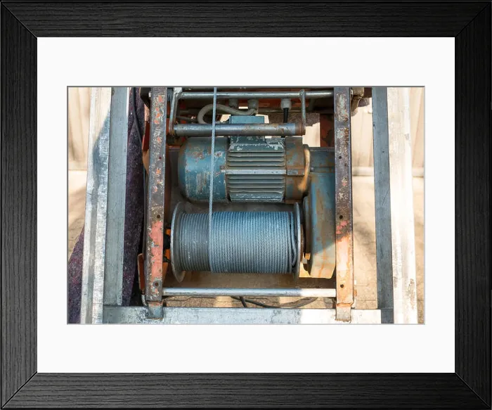 Framed Print : Electric cable winch with steel cable and electric motor Framed Print : Electric cable winch with steel cable and electric motor