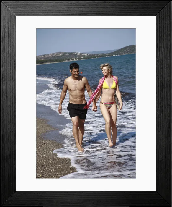 Framed Print : Mature adult couple on beach Framed Print : Mature adult couple on beach