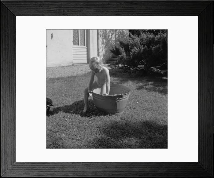 Framed Print : Water fun Girl playing with a pool of water in the garden of the Bachmann house Date: 1960 Location: Bad Mergentheim Framed Print : Water fun Girl playing with a pool of water in the garden of the Bachmann house Date: 1960 Location: Bad Mergentheim