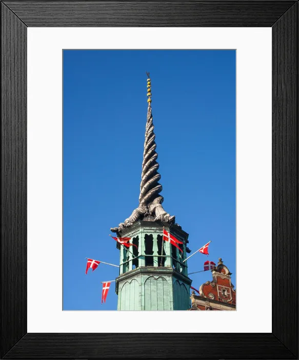 Framed Print : Former Stock Exchange Building with Danish flags flying from the dragon tail spire Copenhagen, Denmark Framed Print : Former Stock Exchange Building with Danish flags flying from the dragon tail spire Copenhagen, Denmark