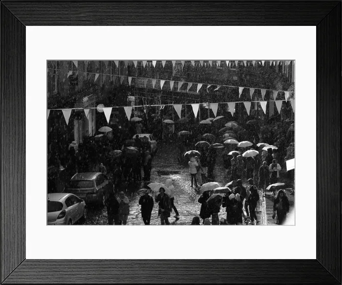Framed Print : Crowds with umbrellas walk in the rain on Victoria Street Framed Print : Crowds with umbrellas walk in the rain on Victoria Street