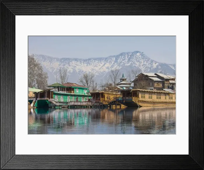 Framed Print : Houseboats on Dal Lake in Srinagar, summer capital of Jammu and Kashmir with Himalayan Mountains in background Framed Print : Houseboats on Dal Lake in Srinagar, summer capital of Jammu and Kashmir with Himalayan Mountains in background