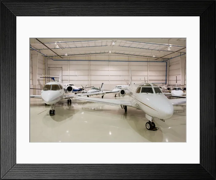 Framed Print : Waterford Michigan Private jets in a hangar at Oakland County International Airport Framed Print : Waterford Michigan Private jets in a hangar at Oakland County International Airport