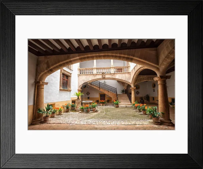 Framed Print : Picturesque mediterranean courtyard with stone pillars and flowers, Palma de Mallorca, Spain Framed Print : Picturesque mediterranean courtyard with stone pillars and flowers, Palma de Mallorca, Spain