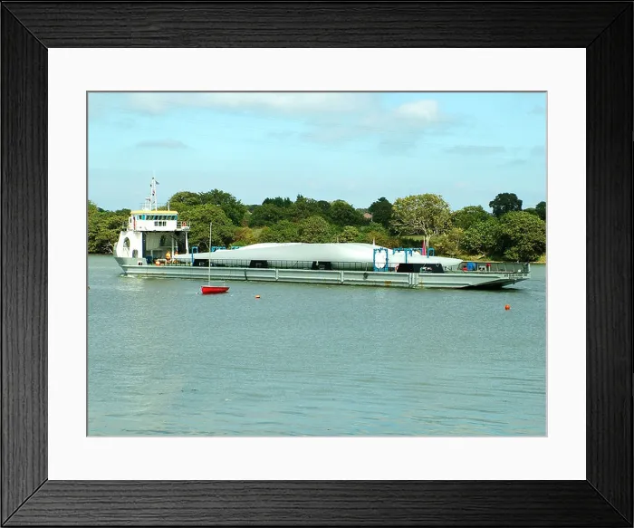 Framed Print : WInd farm turbine blades being transported by river Framed Print : WInd farm turbine blades being transported by river