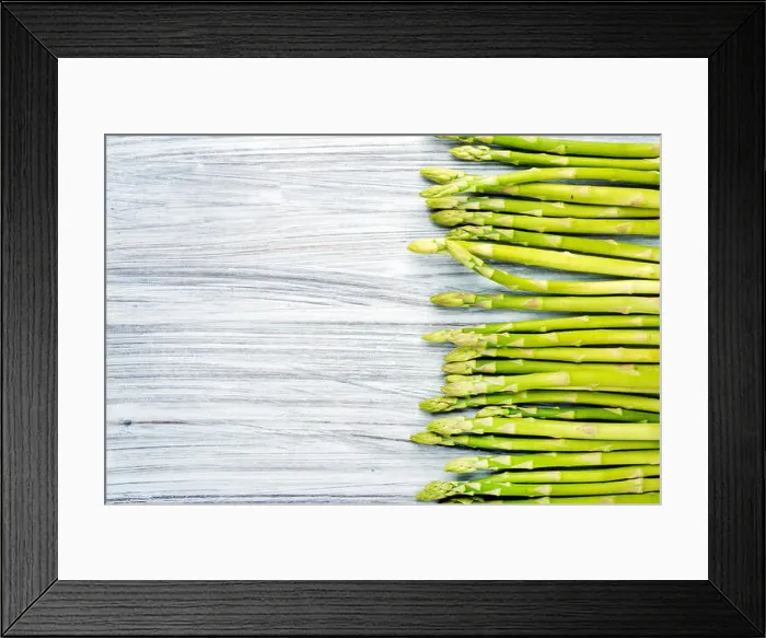 Framed Print : Green fresh sparagus on light painted wooden background. Top view, copy space Framed Print : Green fresh sparagus on light painted wooden background. Top view, copy space
