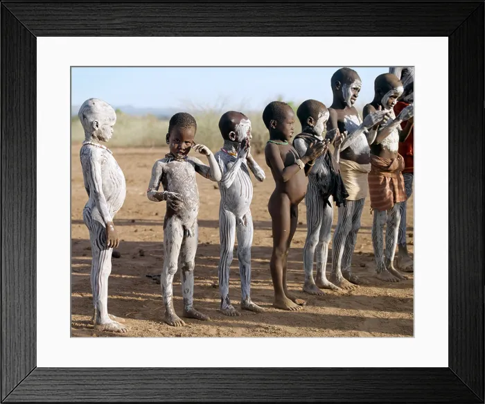 Framed Print : Nyag'atom boys enjoy participating in a dance in the late afternoon.The Nyag'atom are one of the largest tribes Framed Print : Nyag'atom boys enjoy participating in a dance in the late afternoon.The Nyag'atom are one of the largest tribes
