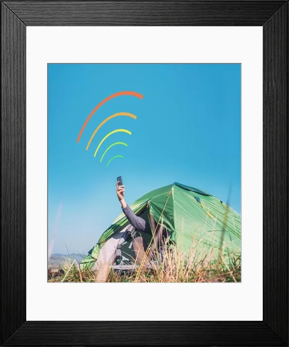 Framed Print : Traveler siting in touristic tent rising the hand with smartphone out and trying to catch cellular network signal Framed Print : Traveler siting in touristic tent rising the hand with smartphone out and trying to catch cellular network signal