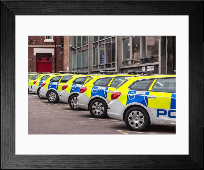 Framed Print : Parked Police cars at a Police Station, England, UK Framed Print : Parked Police cars at a Police Station, England, UK