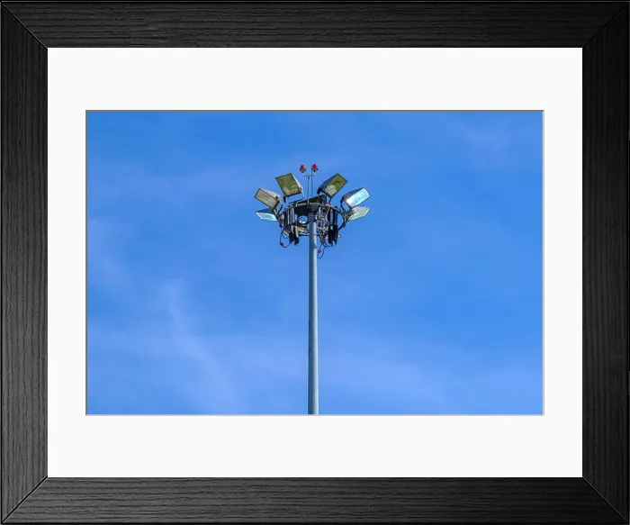 Framed Print : High mast lighting in airport on blue sky background Framed Print : High mast lighting in airport on blue sky background