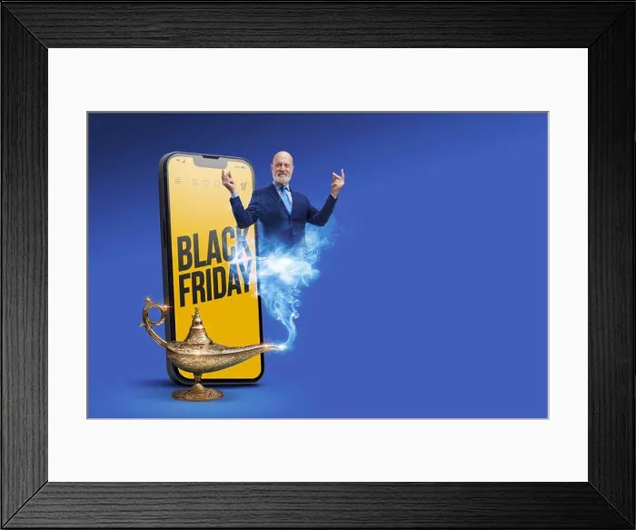 Framed Print : Black Friday sale advertisement on smartphone and genie of the lamp Framed Print : Black Friday sale advertisement on smartphone and genie of the lamp