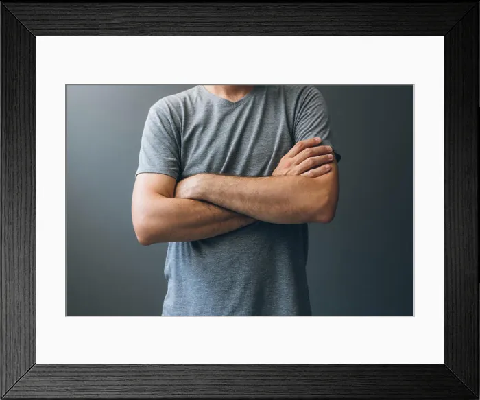 Framed Print : Casual adult man with arms crossed Framed Print : Casual adult man with arms crossed