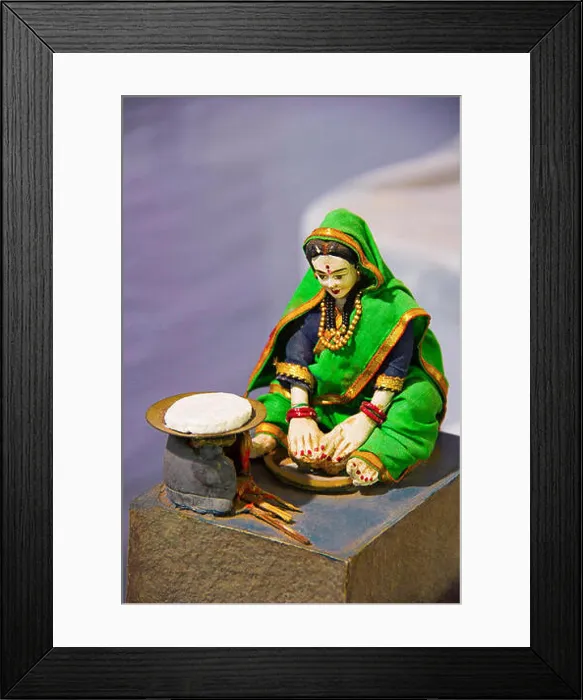 Framed Print : Sculpture of traditional Maharashtrian woman making rotis on a traditional oven or chulla Framed Print : Sculpture of traditional Maharashtrian woman making rotis on a traditional oven or chulla