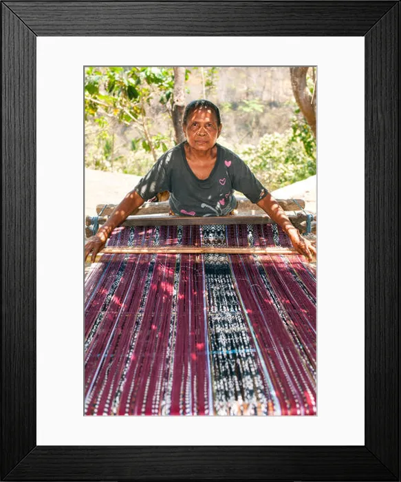 Framed Print : Indonesian woman weaving traditional sarongs on the roadside on the island of Flores in Indonesia Framed Print : Indonesian woman weaving traditional sarongs on the roadside on the island of Flores in Indonesia