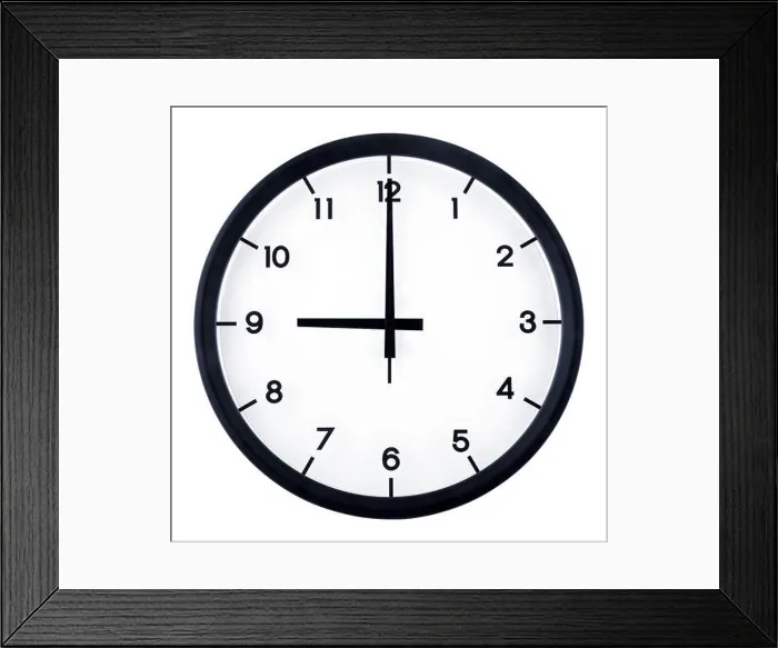 Framed Print : Classic analog clock pointing at 9 o'clock, isolated on white background Framed Print : Classic analog clock pointing at 9 o'clock, isolated on white background