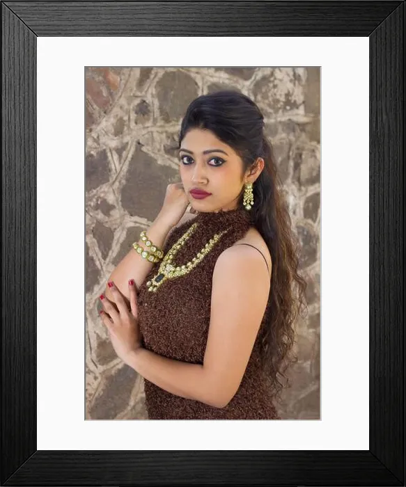 Framed Print : Indian young girl in brown dress with big perl neckless