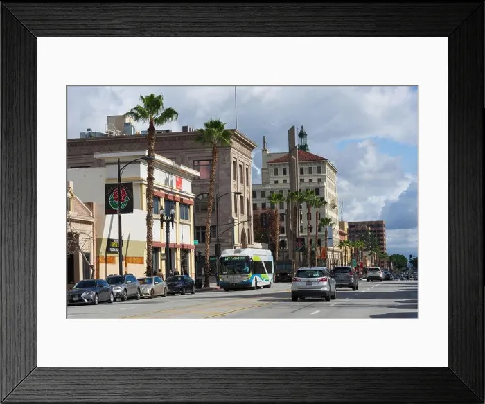 Framed Print : Colorado Boulevard looking east in the City of Pasadena shown against a sky with storm clouds Framed Print : Colorado Boulevard looking east in the City of Pasadena shown against a sky with storm clouds