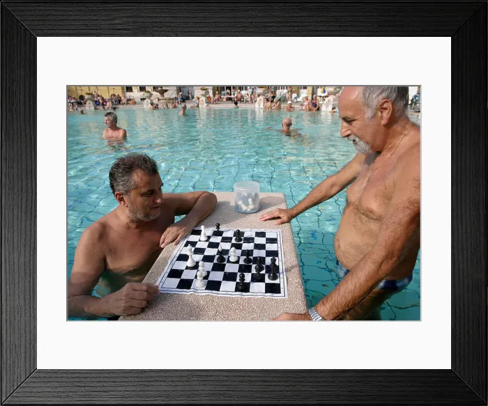 Framed Print : Men playing chess at Szechenyi thermal baths in Budapest Hungary