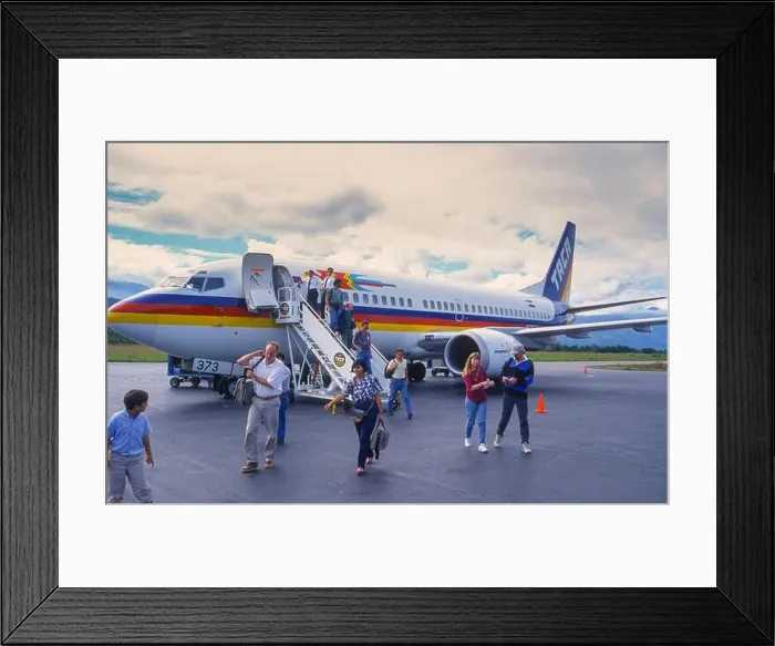 Framed Print : LA CEIBA AIRPORT, HONDURAS, DECEMBER 1995 - Passengers getting off TACA commercial jet at airport Framed Print : LA CEIBA AIRPORT, HONDURAS, DECEMBER 1995 - Passengers getting off TACA commercial jet at airport