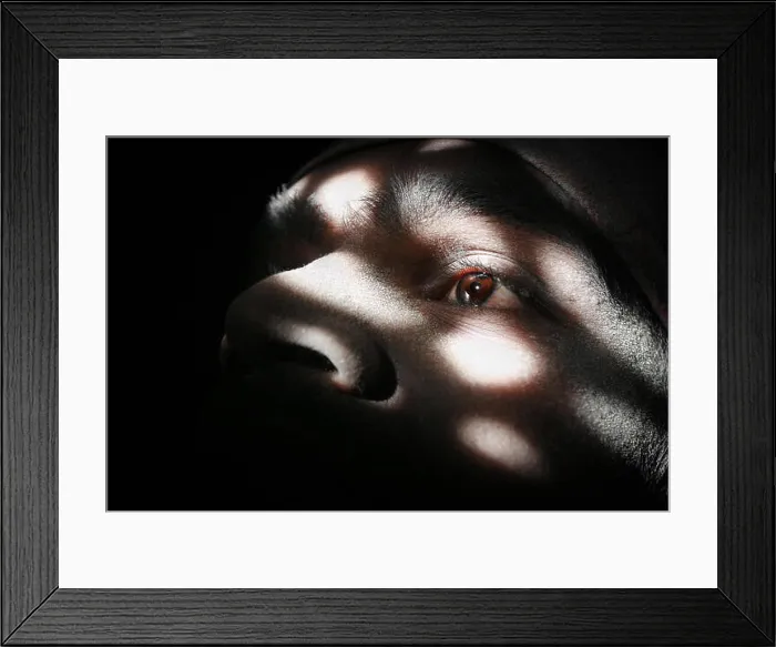 Framed Print : Chiaroscuro close up on the eye of an Indian man covered with dust Framed Print : Chiaroscuro close up on the eye of an Indian man covered with dust