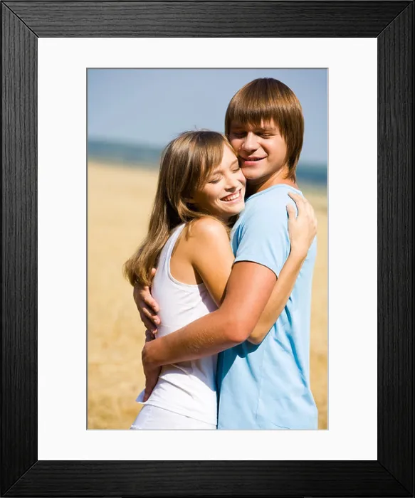 Framed Print : Portrait of girlfriend and boyfriend hugging each other Framed Print : Portrait of girlfriend and boyfriend hugging each other