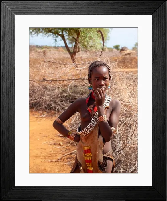 Framed Print : Young Hamer girl with traditional dress and jewelry Framed Print : Young Hamer girl with traditional dress and jewelry