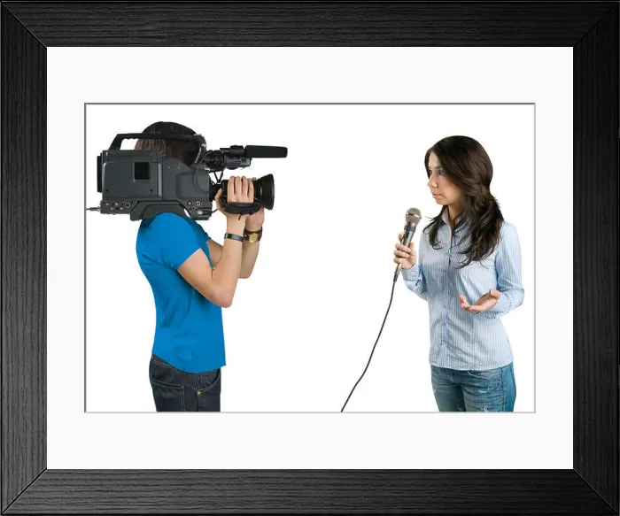 Framed Print : TV reporter presenting the news in studio, isolated on white background Framed Print : TV reporter presenting the news in studio, isolated on white background