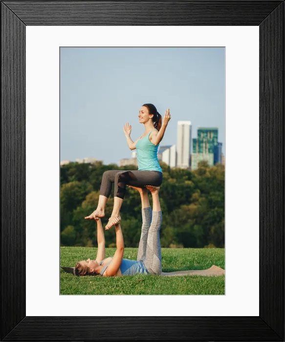 Framed Print : Two young beautiful Caucasian women yogi doing chair throne acro yoga pose Framed Print : Two young beautiful Caucasian women yogi doing chair throne acro yoga pose