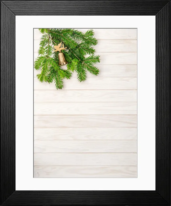 Framed Print : Christmas tree branches on bright wooden background. Undecorated evergreen twigs Framed Print : Christmas tree branches on bright wooden background. Undecorated evergreen twigs