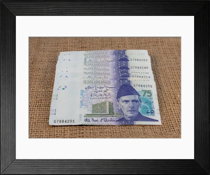 Framed Print : Pakistan new seventy five rupees blue commemorative notes Framed Print : Pakistan new seventy five rupees blue commemorative notes