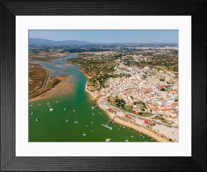 Framed Print : Aerial view, bay with yachts and view of coastal town Alvor, Algarve, Portugal Framed Print : Aerial view, bay with yachts and view of coastal town Alvor, Algarve, Portugal