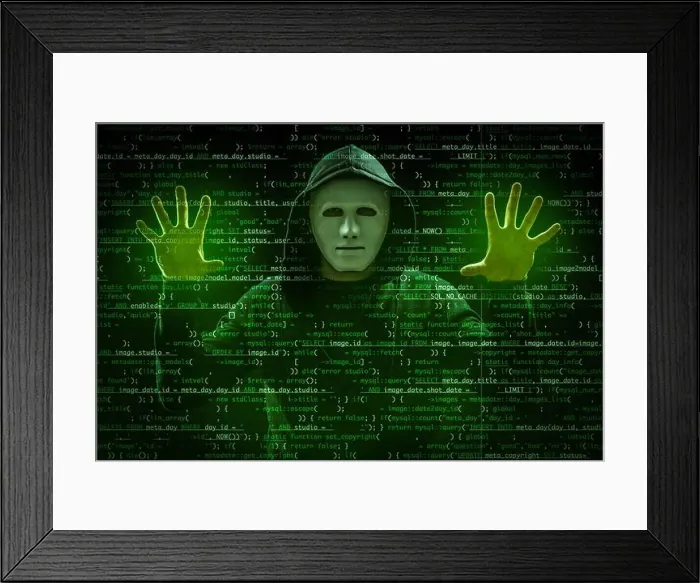 Framed Print : Hacker in mask working with virtual screen against dark background. Concept of cyber security and attack Framed Print : Hacker in mask working with virtual screen against dark background. Concept of cyber security and attack
