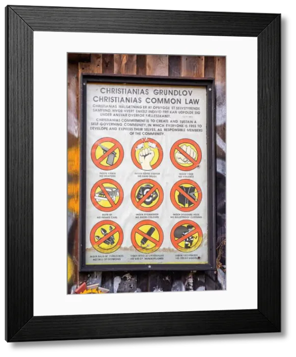 Framed Print : Nine rules of Freetown Christiania's common law. Sign on the wall in Copenhagen, Denmark Framed Print : Nine rules of Freetown Christiania's common law. Sign on the wall in Copenhagen, Denmark