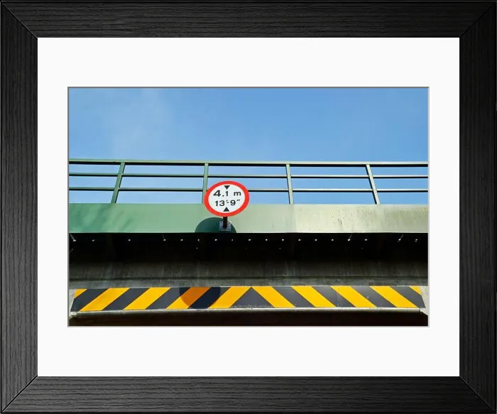 Framed Print : 4.1m, 13 9' bridge height sign, with black and yellow warning stripe on rural tunnel Framed Print : 4.1m, 13 9' bridge height sign, with black and yellow warning stripe on rural tunnel