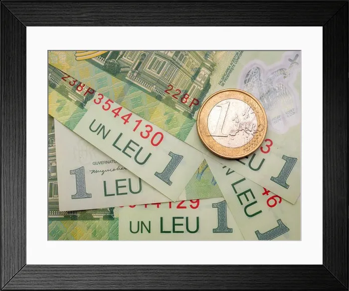 Framed Print : The Romanian one leu banknotes and a one euro coin Framed Print : The Romanian one leu banknotes and a one euro coin