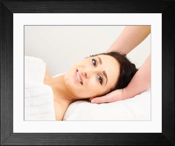 Framed Print : Massage, professional masseur and a woman customer