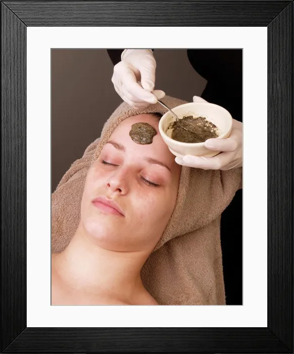 Framed Print : woman with eyes closed while Chinese peeling mask of herbs algae and seaweed is applied on her face Framed Print : woman with eyes closed while Chinese peeling mask of herbs algae and seaweed is applied on her face
