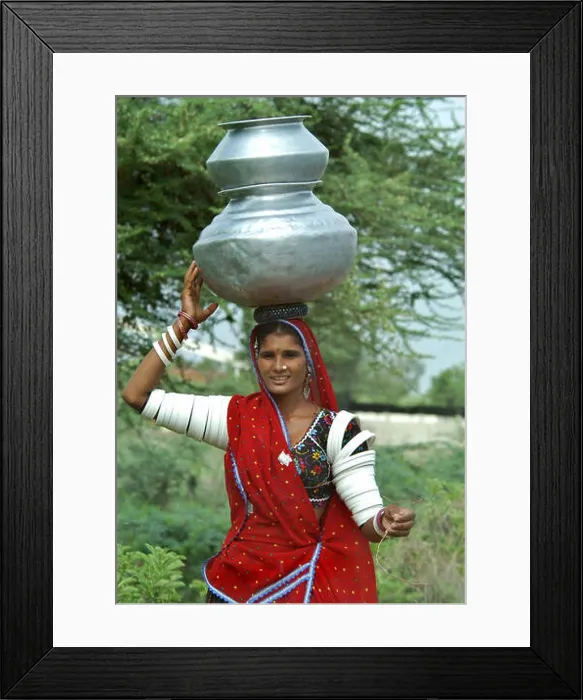Framed Print : Tribal women carrying water pot Framed Print : Tribal women carrying water pot